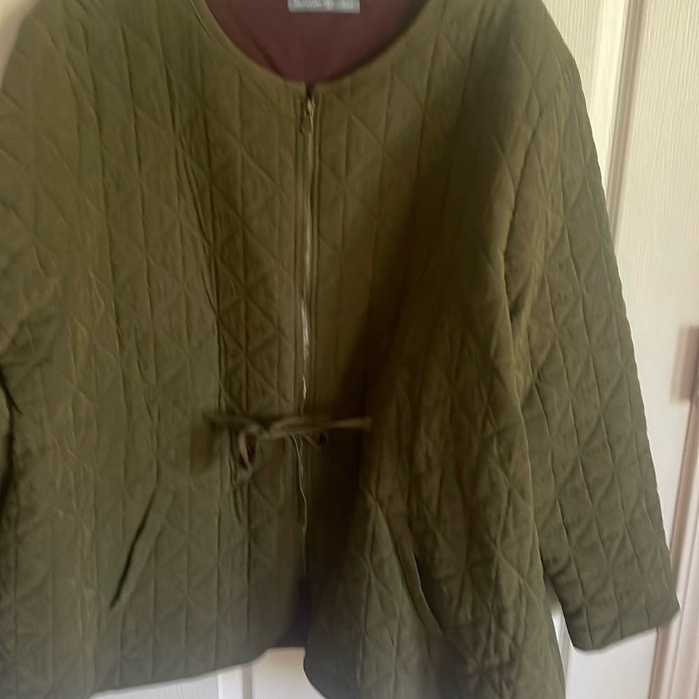 New no tags. Never worn quilted jacket